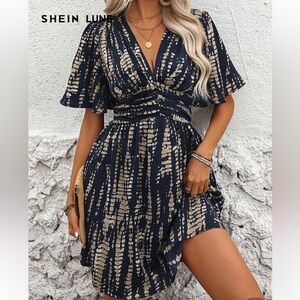 Elegant Navy and Gold Patterned Dress